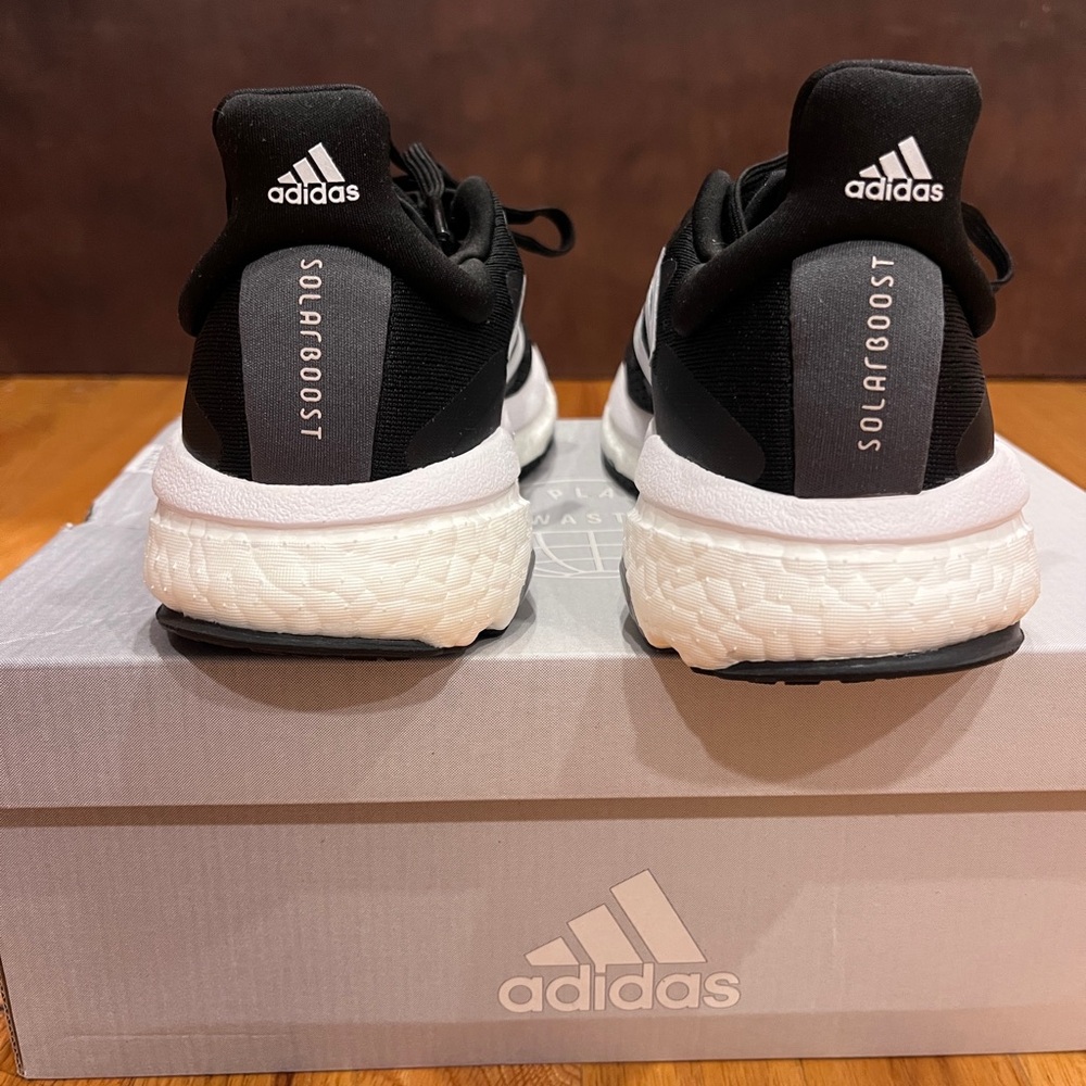 Brand new, never worn, Adidas Solarboost Black and White Sneakers